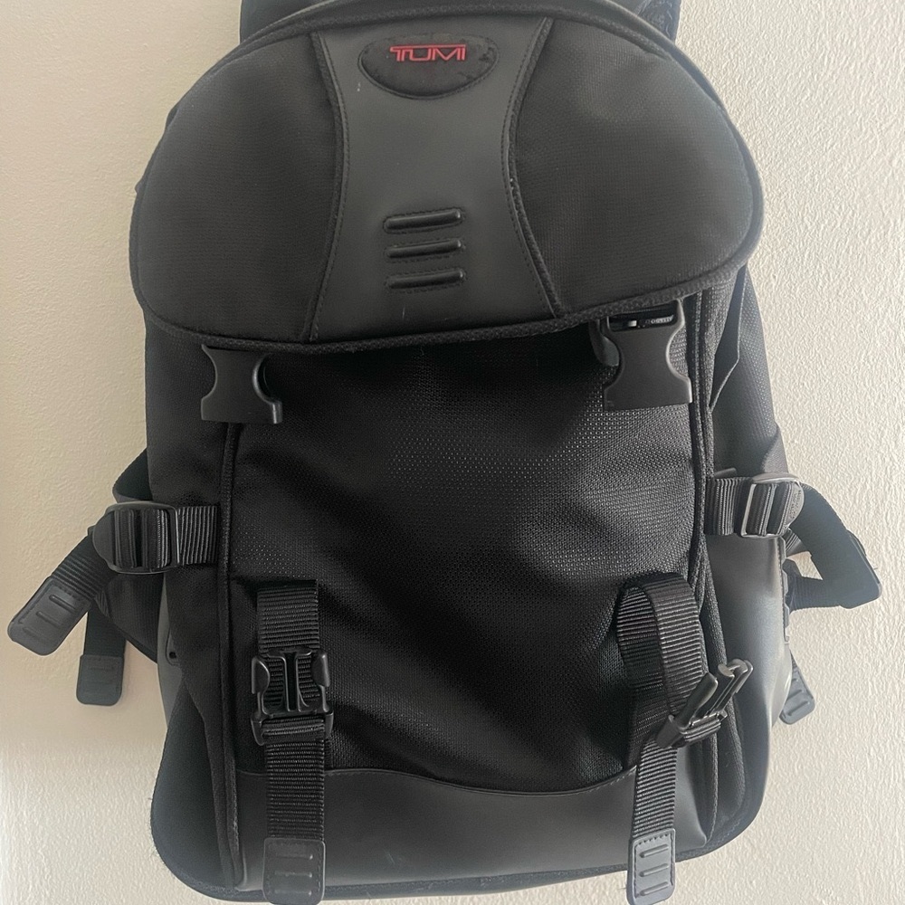 Tumi Black Backpack with Adjustable Straps and Modern Design